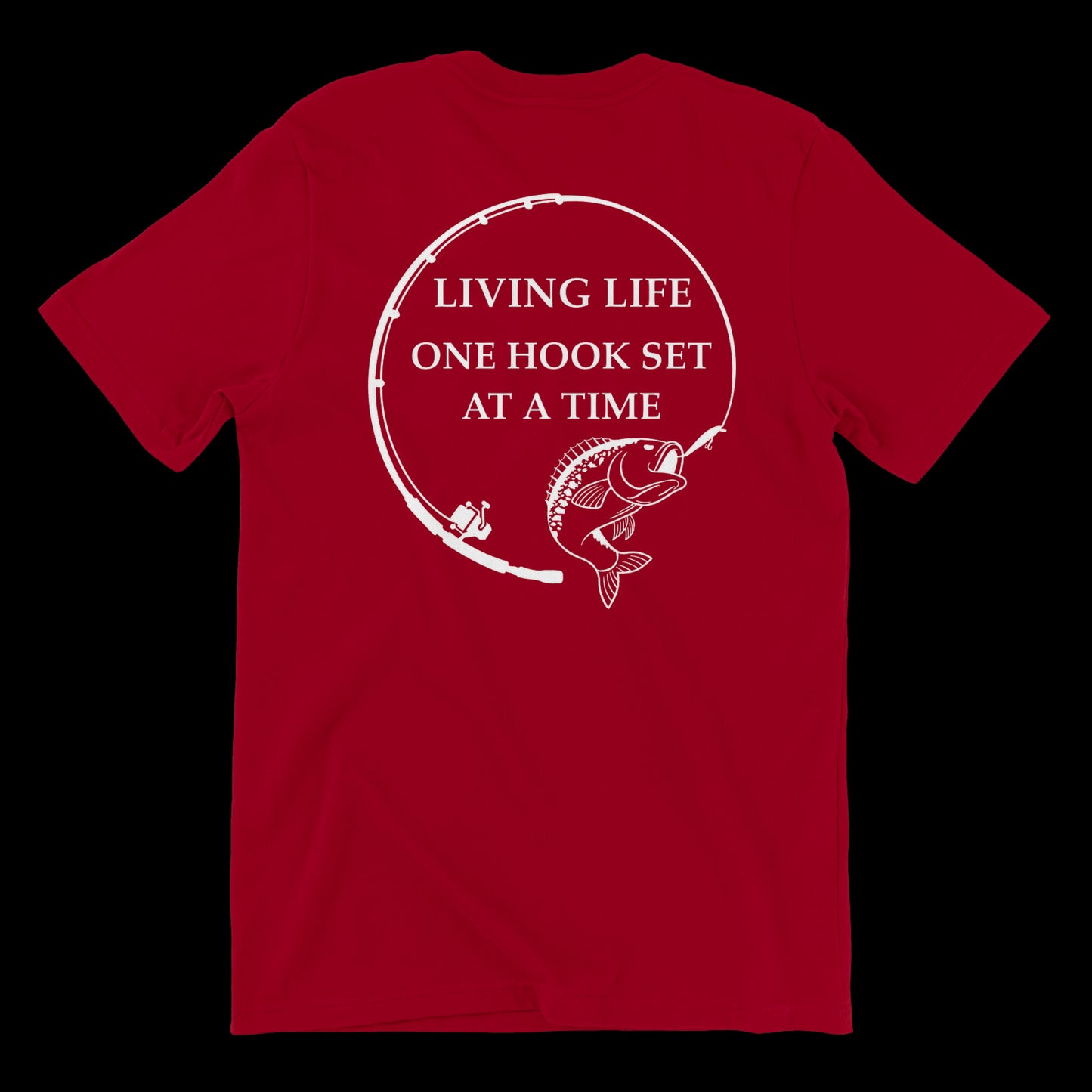 Back side of a red t shirt with a fishing rod bent in a circle and a large mouth bass at the end of it. In the middle of the design it says Living life one hook set at a time in capital letters