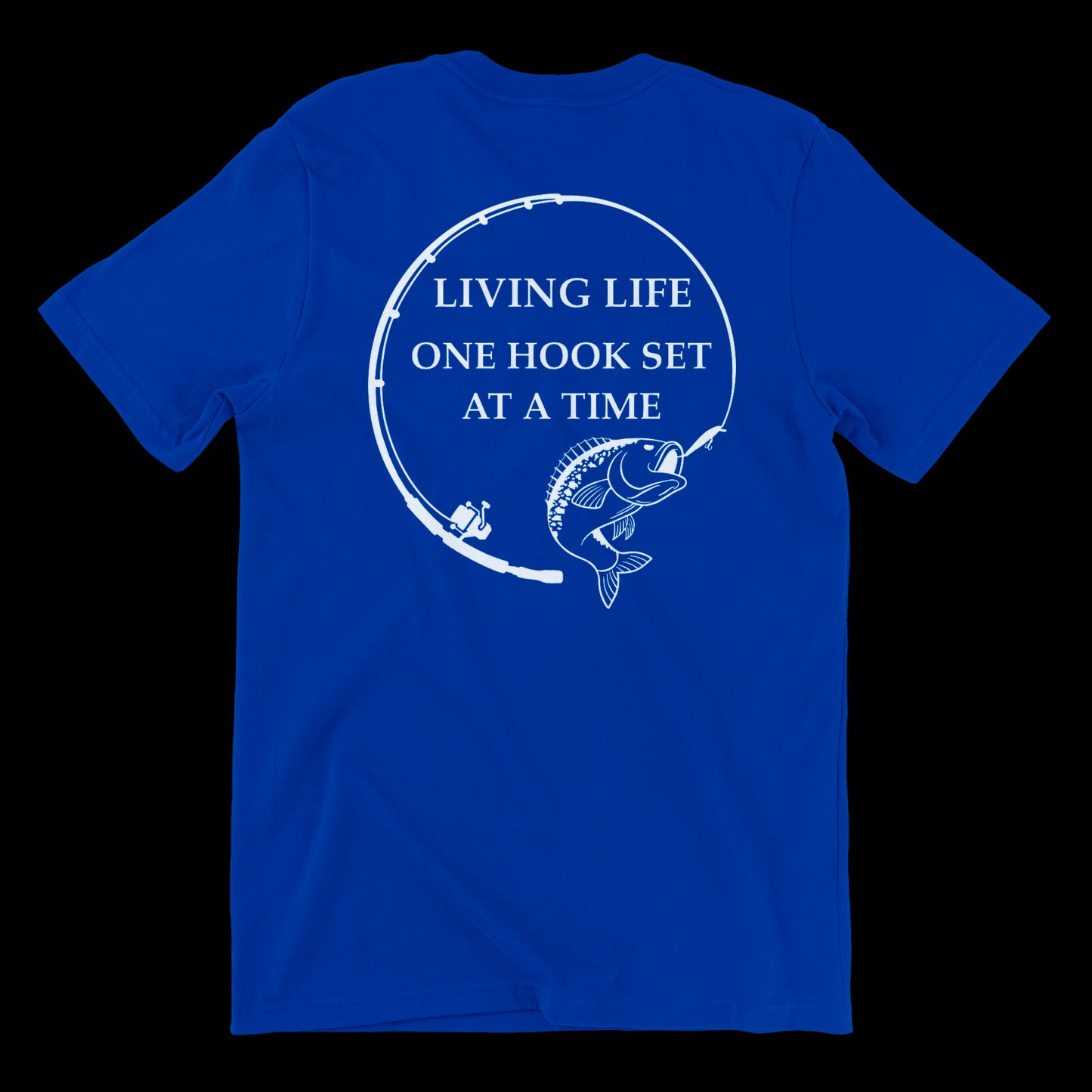 Back side of a blue t shirt with a fishing rod bent in a circle and a large mouth bass at the end of it. In the middle of the design it says Living life one hook set at a time in capital letters